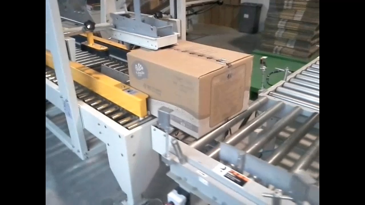 紙巾廠自動(dòng)開(kāi)箱折蓋封箱機(jī)案例視